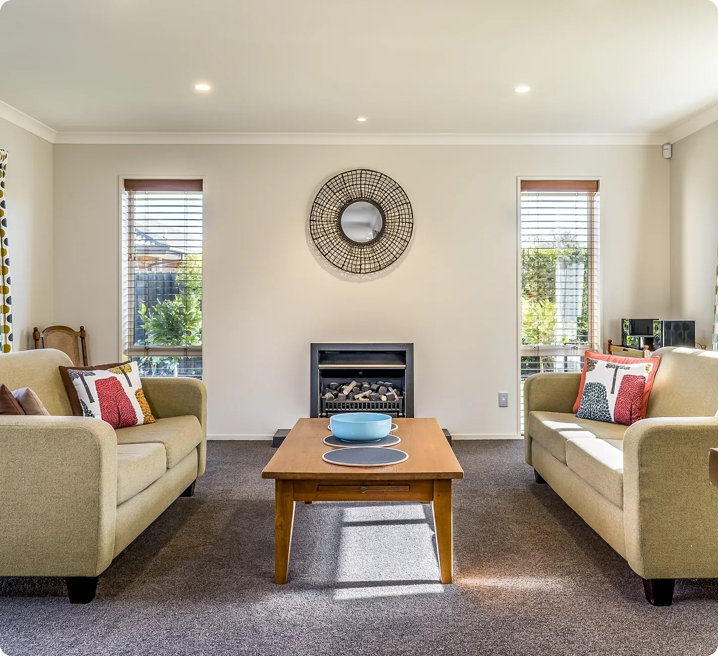 Clean living room with a fireplace